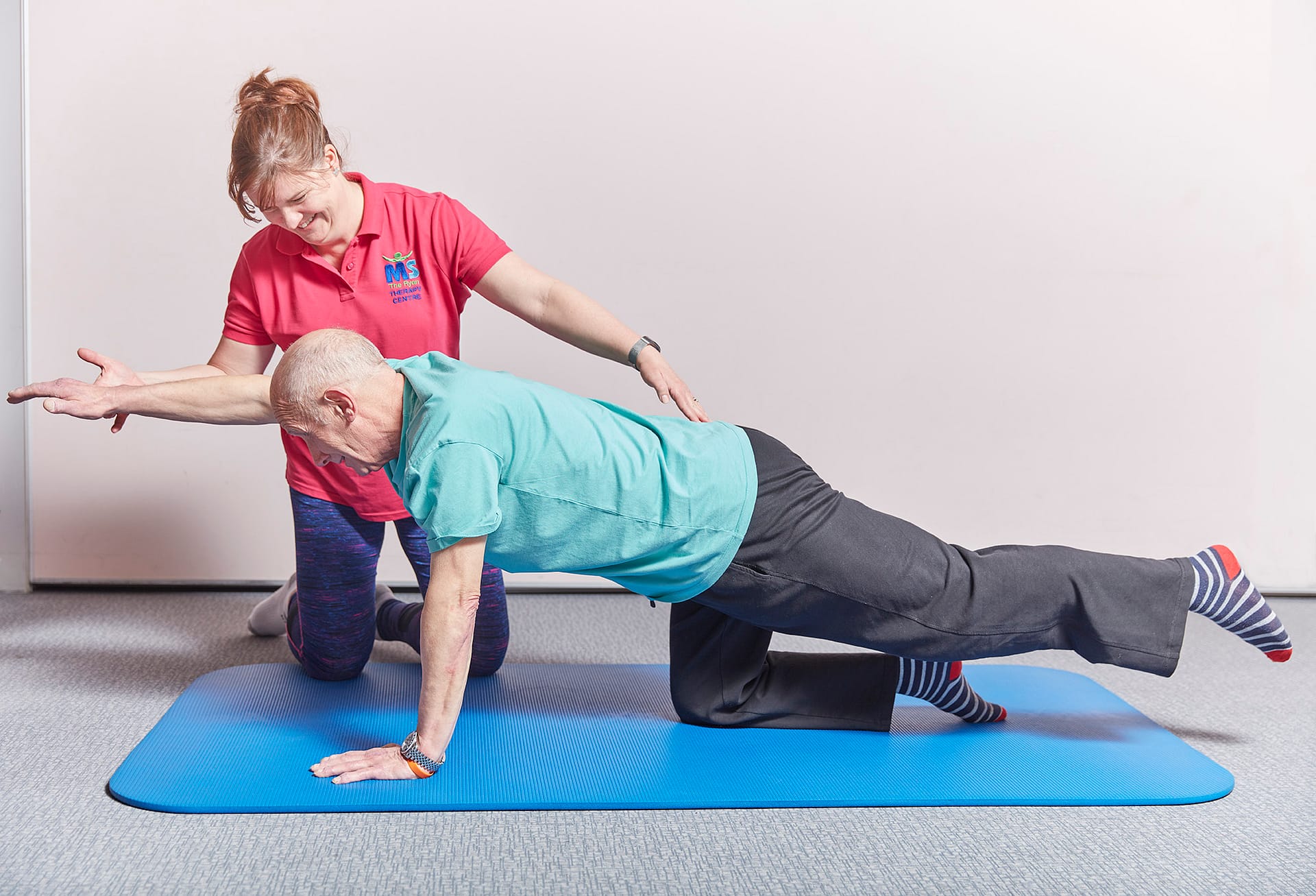 Members doing balance exercises